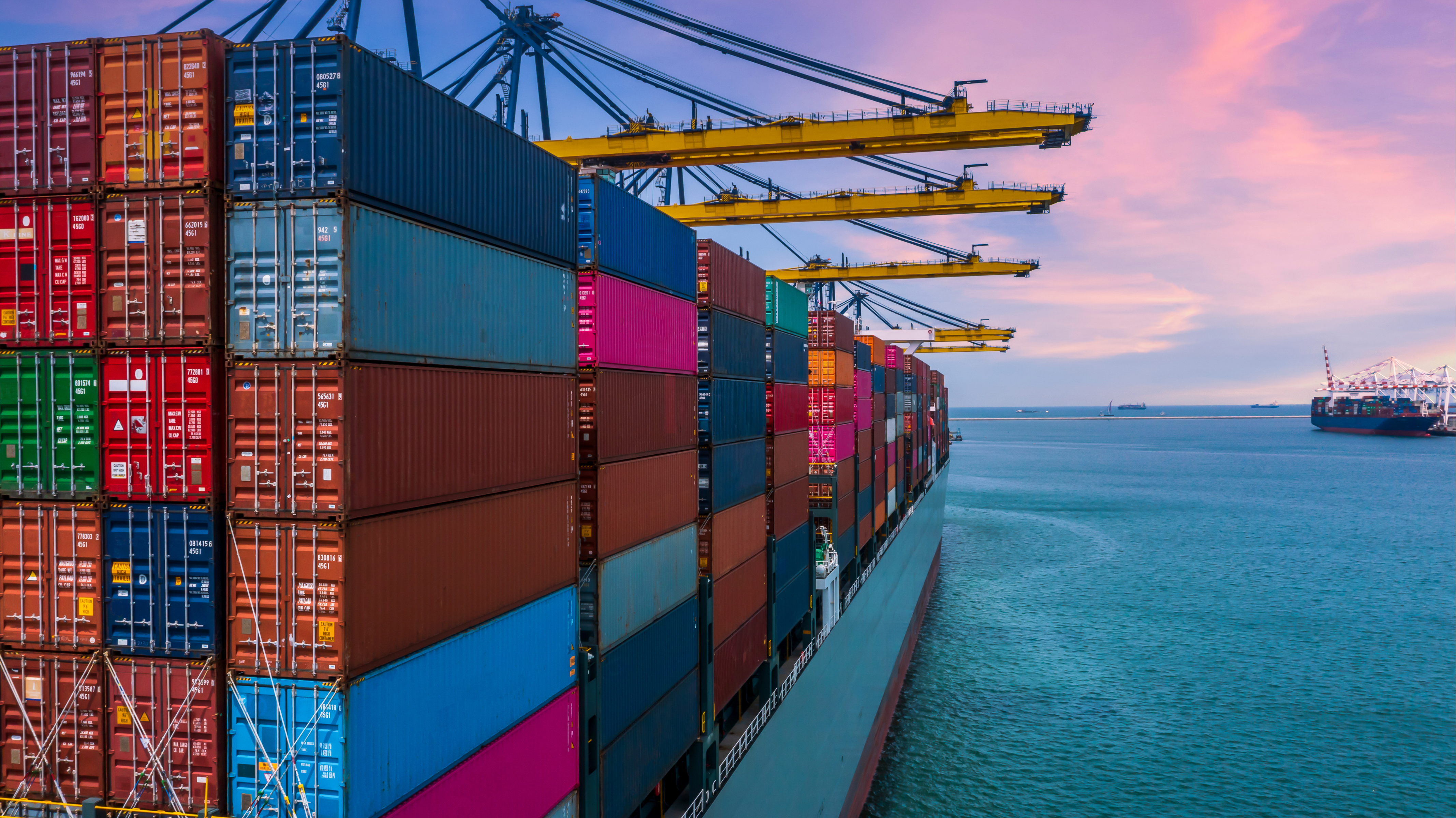 ILA port strike looms over the logistics industry. Pictured: colorful freight cargo shipment containers on their way to port